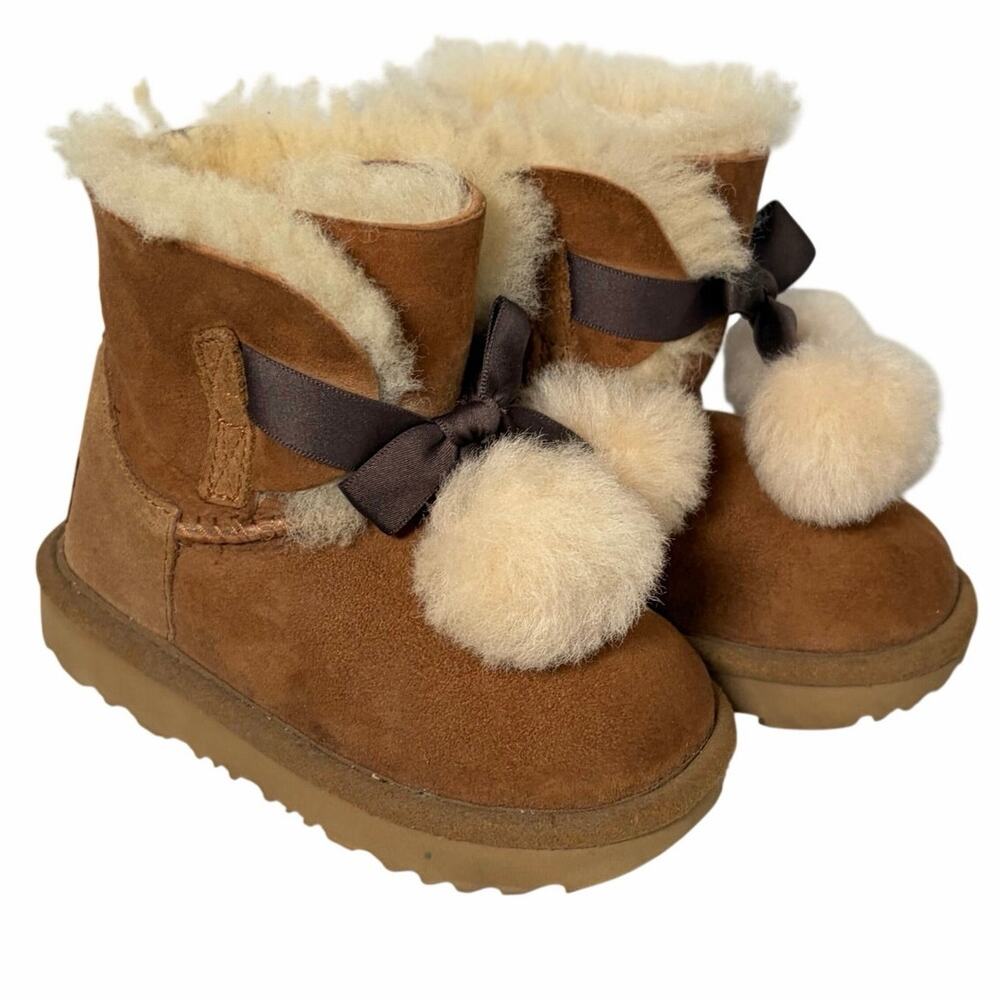 UGG Toddler Gita chestnut boots.  Front bow pom-poms.  Size 8T. Worn once